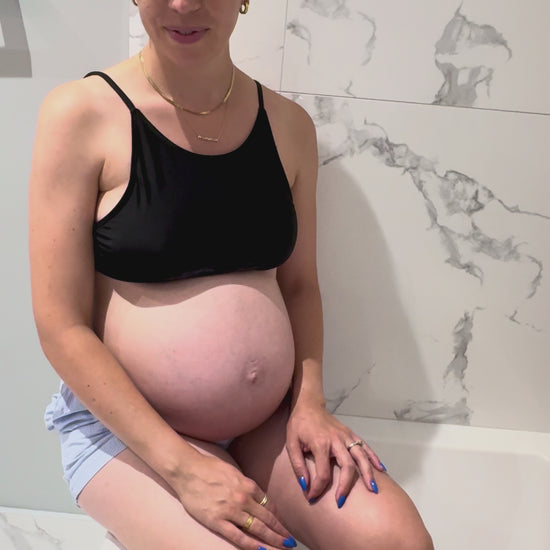 Video demonstrating application of Bunnyroo Mud Mask on a pregnant woman’s belly